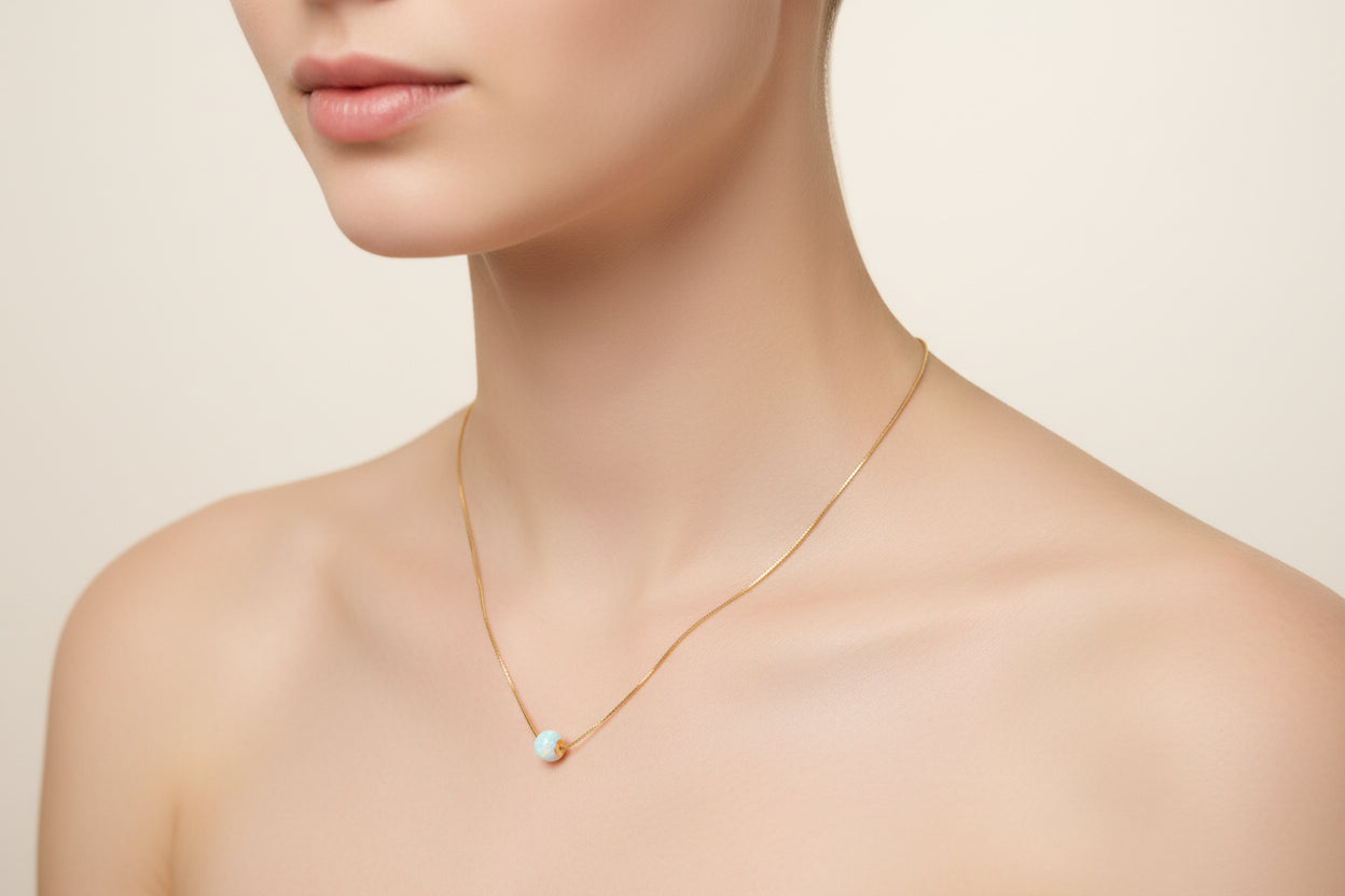 Cadena  laminada con bolita de larimar
