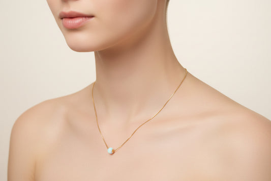 Cadena  laminada con bolita de larimar