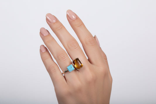 Anillo Cruzado de Ámbar y Larimar – Ajustable