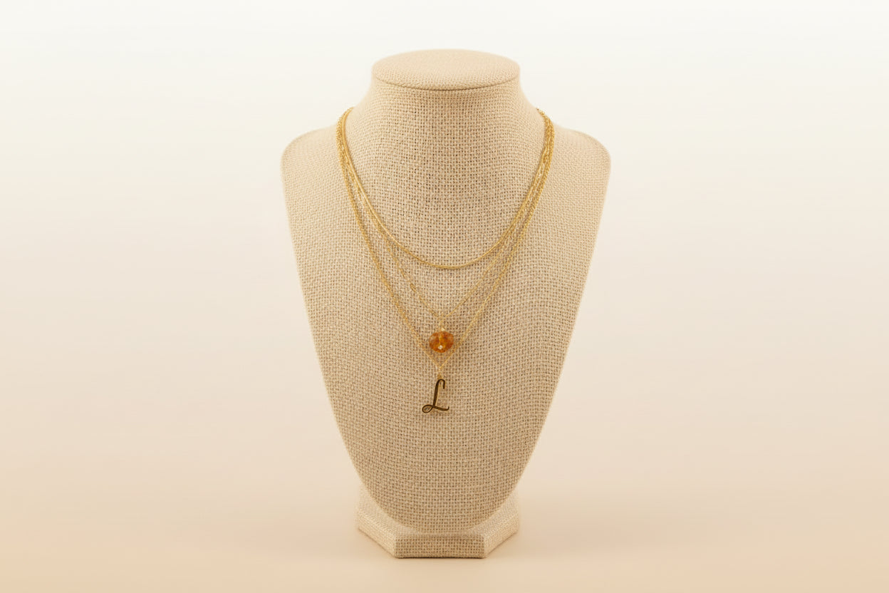 Cadena triple L, Ambar